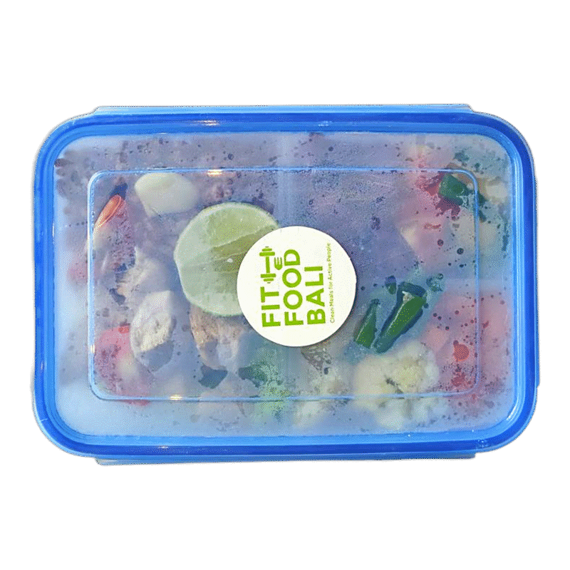 A sealed Fit Food Bali container with the logo sticker